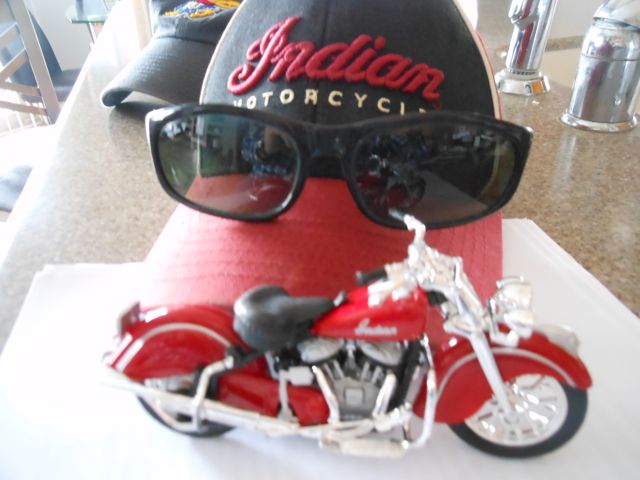 My new Indian, posing with my old hat.  Thanks again Hoser for thinking of me.