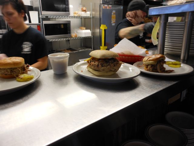 The food really started rolling out of the kitchen.  That sandwich in the middle was "the special".  A lot of meat with two sides for $6.99.