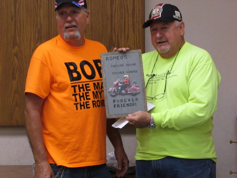 Bob K. presented some Romeo appreciation plaques.  Mick's had a cutout of him riding his red Indian.