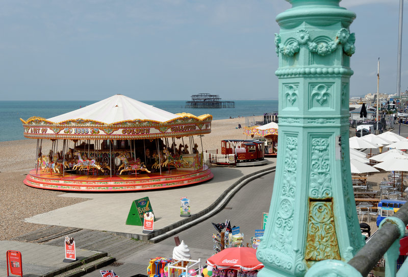 Carousel with the old pier in the background.