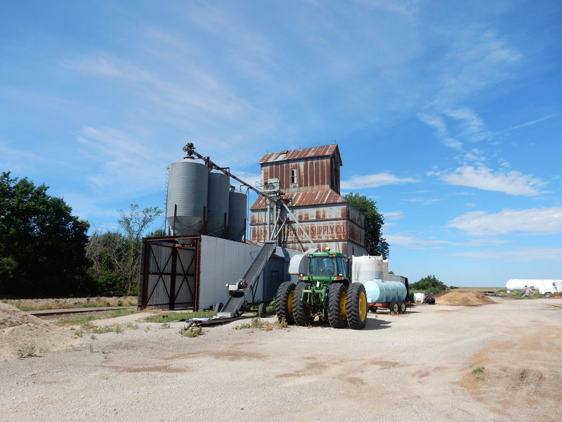 The old Tampa grain elevator stands proudly next to the rail line.