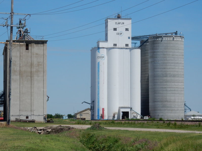 Claflin's modern elevator and unusual vintage square elevator are both still in use.