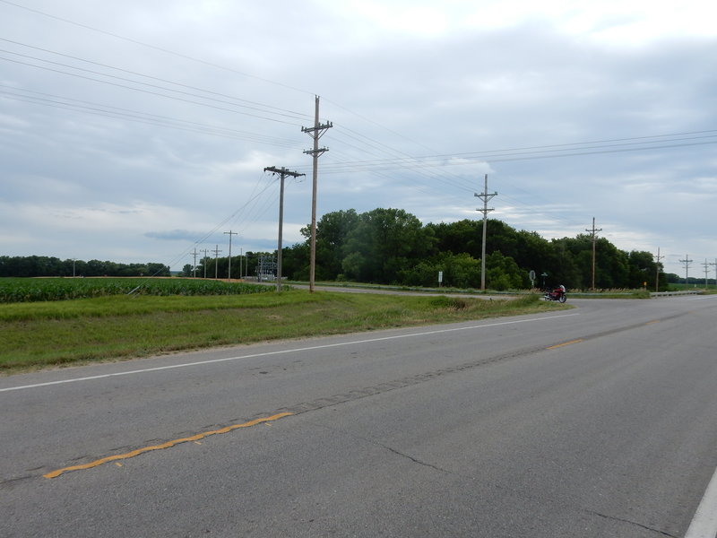 To find the bridge look for the only paved road going north.