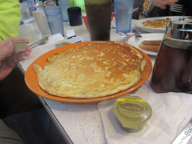 LARRY #2 ORDERED ONE PANCAKE, AND AFTER EATING FOR ABOUT HALF AN HOUR, HE OFFERED TO SELL THE LAST HALF OF IT FOR FIFTY CENTS.  NO TAKERS THOUGH.