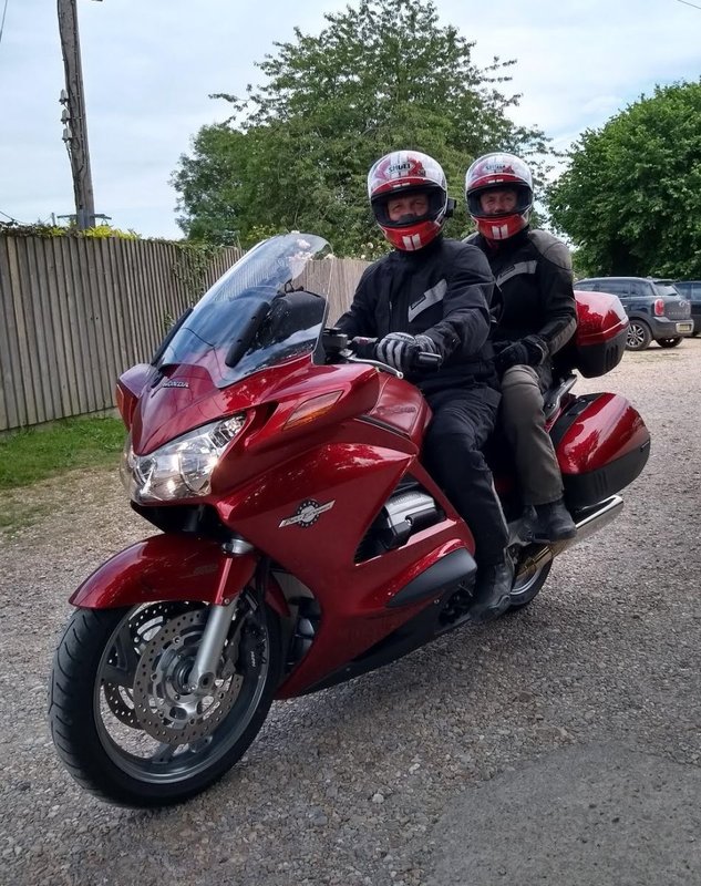 Jon with me on the back. (It's good to be back riding again that's for sure!)