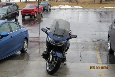 John's poor wet, cold Honda, rain and even snow across the lot!