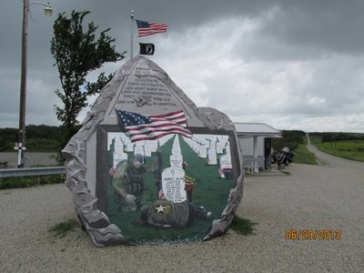 It was storming when we got there, a shelter is on site, notice the Minnesota bikers making use of it.