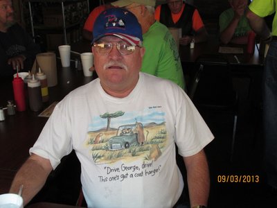 George wearing a Gary Larson t-shirt.  That's funny right there!