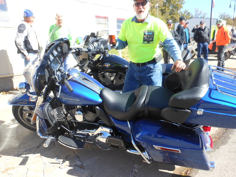 Speaking of Milwaukee iron via Topeka HD, Larry # 3 is keeping a pretty watchful eye on his new Limited which when he arrived today had all of 153 miles on it.  That metallic blue paint was absolutely gorgeous in the mid-day sun.  He said he bought it so he could have a new GPS.  Nobody tell him he could have had a new GPS for a lot less than he paid for this one!!