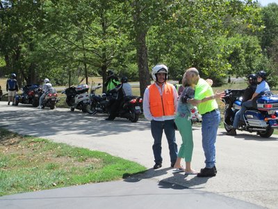 Pam telling Roger how much the family appreciated our gesture.