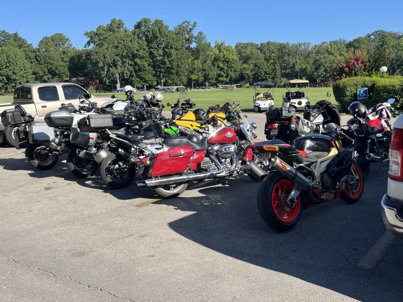 We definitely took up some real estate today. Bill’s beautiful Aprilla there on the far right. That bike sounds awesome !