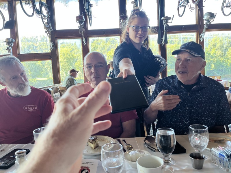 I was enjoying our breakfast and fellowship until our server Hunter ruined the moment for me. I thought just maybe .. Jim, Mike or Leo might intercept the check and treat me. Guess they all had alligator arms today.