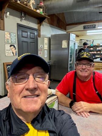 Dave and Mike stayed Dry at Hilltop Market.