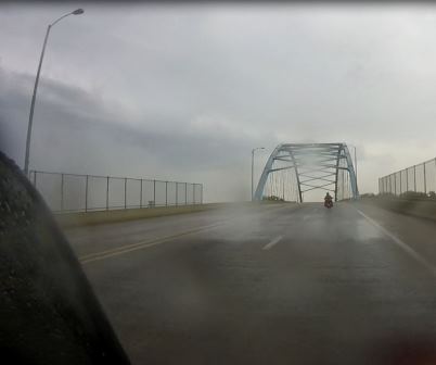 I followed Scott across the Atchison bridge in the rain going home.
