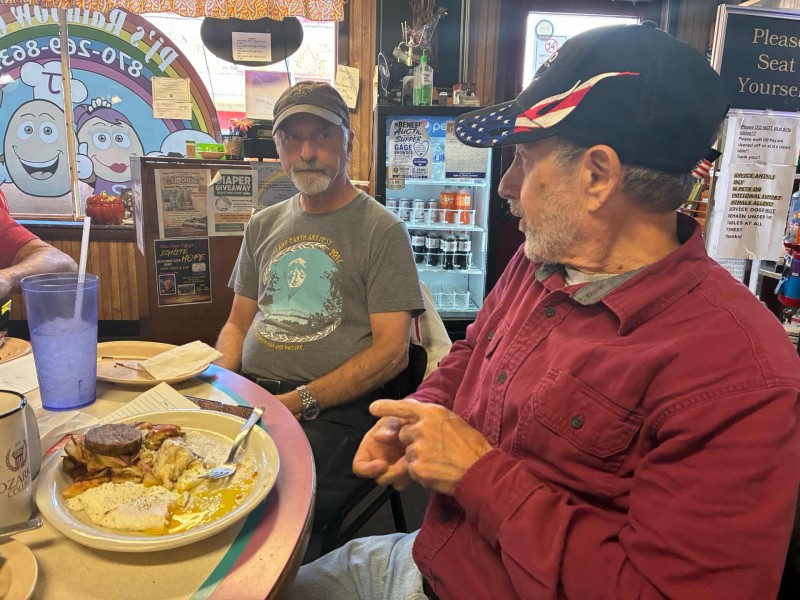 Johnny Fast Hands Hamilton (Mike’s body guard) and Mike Rowland having an intense conversation. Thank you Mike for taking some of my biscuits and gravy. The Merryman brothers were giving me a tough time about ordering enough to feed three people. Again, thank you Mike. I’m gonna start ordering smaller portions.