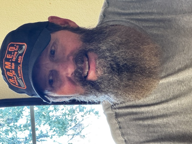 Al wearing a beard for disguise
