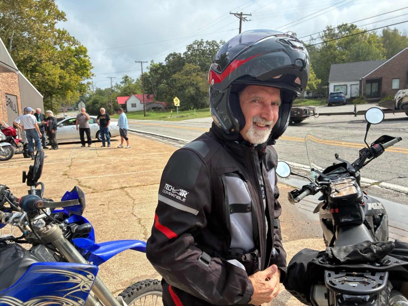John was complaining about his new helmet being a bit too small .. it’s actually very beautiful .. might even fit me. Fix the intercom system and I’ll buy it.