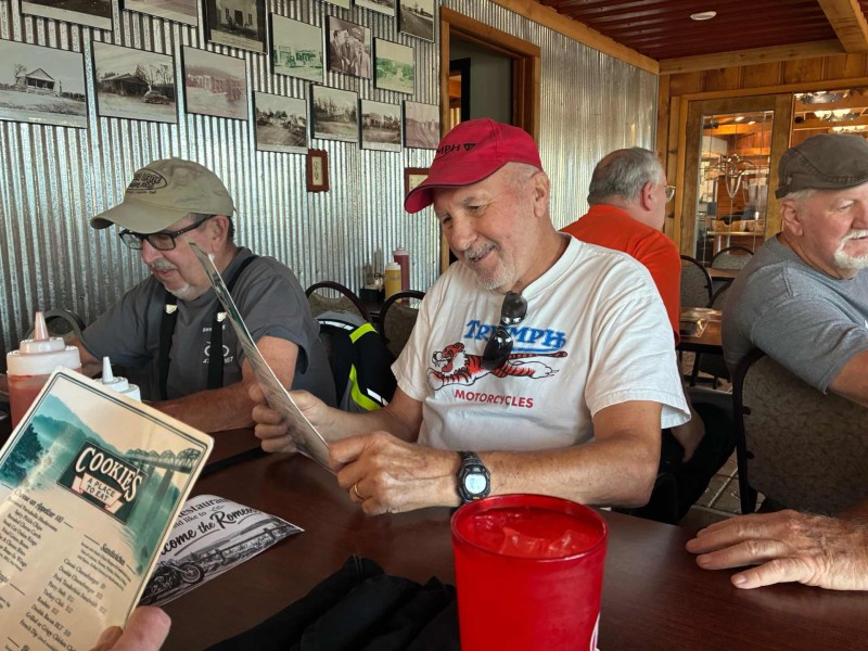 Leo was really studying the menu. Turkey club was a great choice. Nice prayer today too .. thank you.