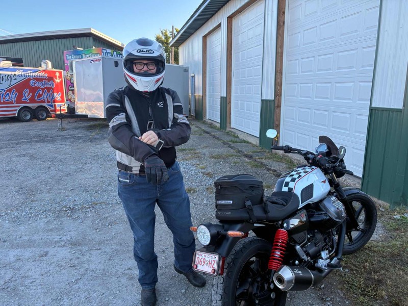 Glenn Brouwer next to his stunning Moto Guzzi.